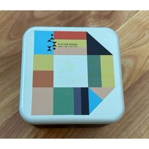 Fossil empty watch tin from the "Alphabet Series" with the letter "D" design.